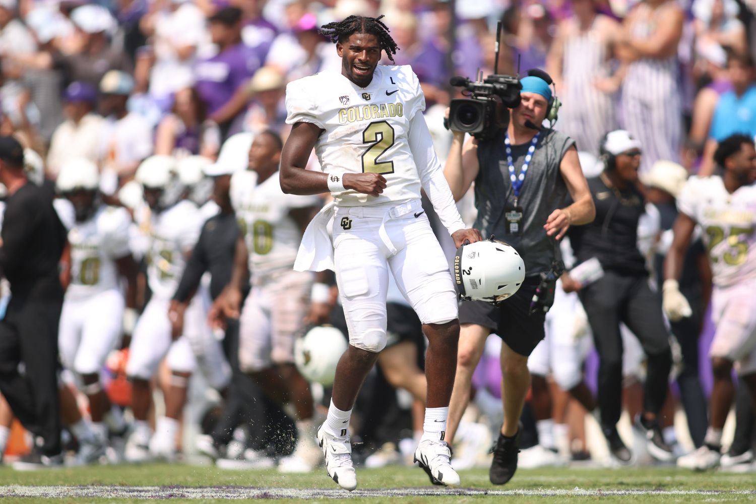 Colorado Buffaloes quarterback Shedeur Sanders (2) celebrates after winning the game against the TCU Horned Frogs at Amon G. Carter Stadium